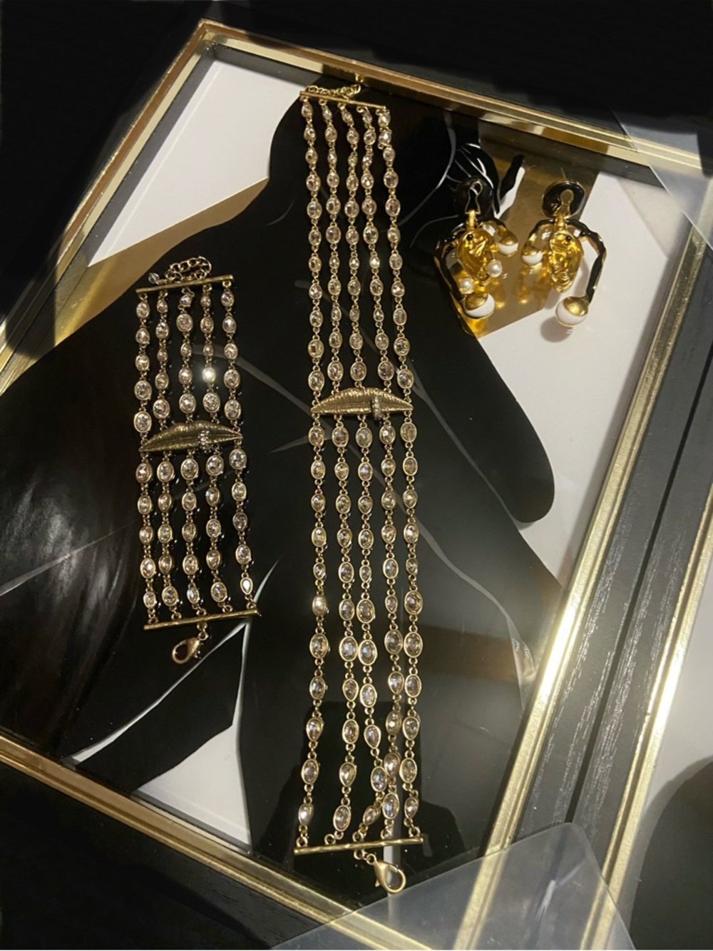 Schiaparelli Earrings, Necklace , and Bracelet